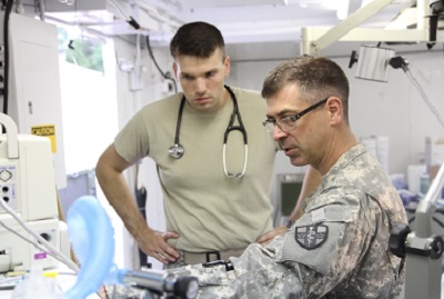 Service members inspect equipment prior to surgery at IRT in Norwich, NY