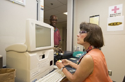 Pharmacy counter six, plus Influx of volunteers help keep Rader pharmacy at full speed