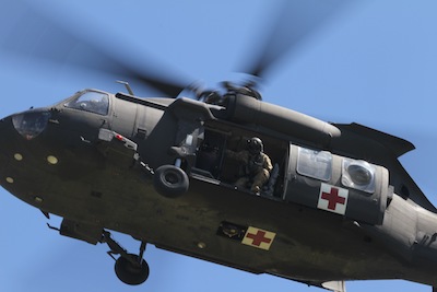 U.S. Army Medevac soars through nuclear catastrophe training