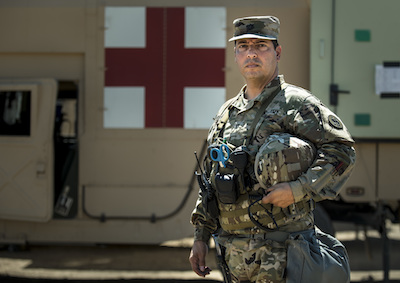 Brigade surgeon cares for all Soldiers in the field