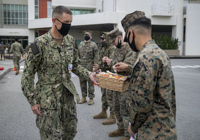 Service members across Okinawa receive the Moderna COVID-19 vaccine