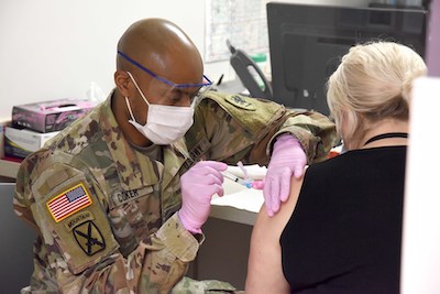 Michigan Guard works with community health departments; administers COVID-19 vaccines