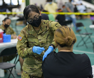 U.S. Army 25th Infantry Division Soldiers Administer Vaccines at Guam Department of Public Health and Social Services COVID-19 Vaccine Clinic