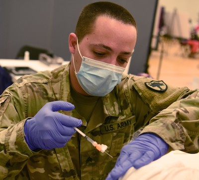 South Carolina National Guard medics administer COVID-19 vaccinations