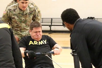 U.S. Pfc. Michael Rosas, Brooke Army Medical Center Soldier Recovery Unit, gets intense during the rowing event at the U.S. Army Adaptive Sports Camp, Fort Bragg, North Carolina, April 5, 2023. Over 70 wounded, ill and injured Soldiers are training in a series of athletic events archery, cycling, shooting, sitting volleyball, swimming, powerlifting, track, field, rowing, wheelchair basketball, and wheelchair rugby. The Adaptive Sports Camp celebrates wounded, ill, and injured Soldiers’ ability to recover and overcome. The Army holds qualifying trials for Active Duty, wounded, ill or injured Soldiers to assess and select athletes for competition in the Warrior Games Challenge. This year, the Warrior Games Challenge takes place in June 2023 at Naval Air Station North Island in San Diego, California. (DoD photo by Robert A. Whetstone)