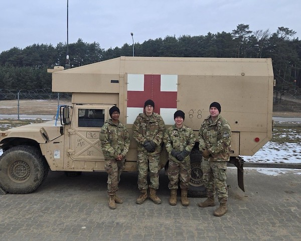 U.S. Army medical team renders aid to Polish allies following vehicle accident